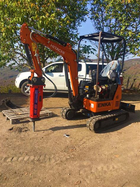 mini excavator with hydraulic hammer|excavator mounted hydraulic hammer.